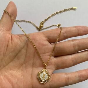 Authentic Yves Saint Laurent YSL Logo Gold Tone Necklace with Rhinestone Pendant
